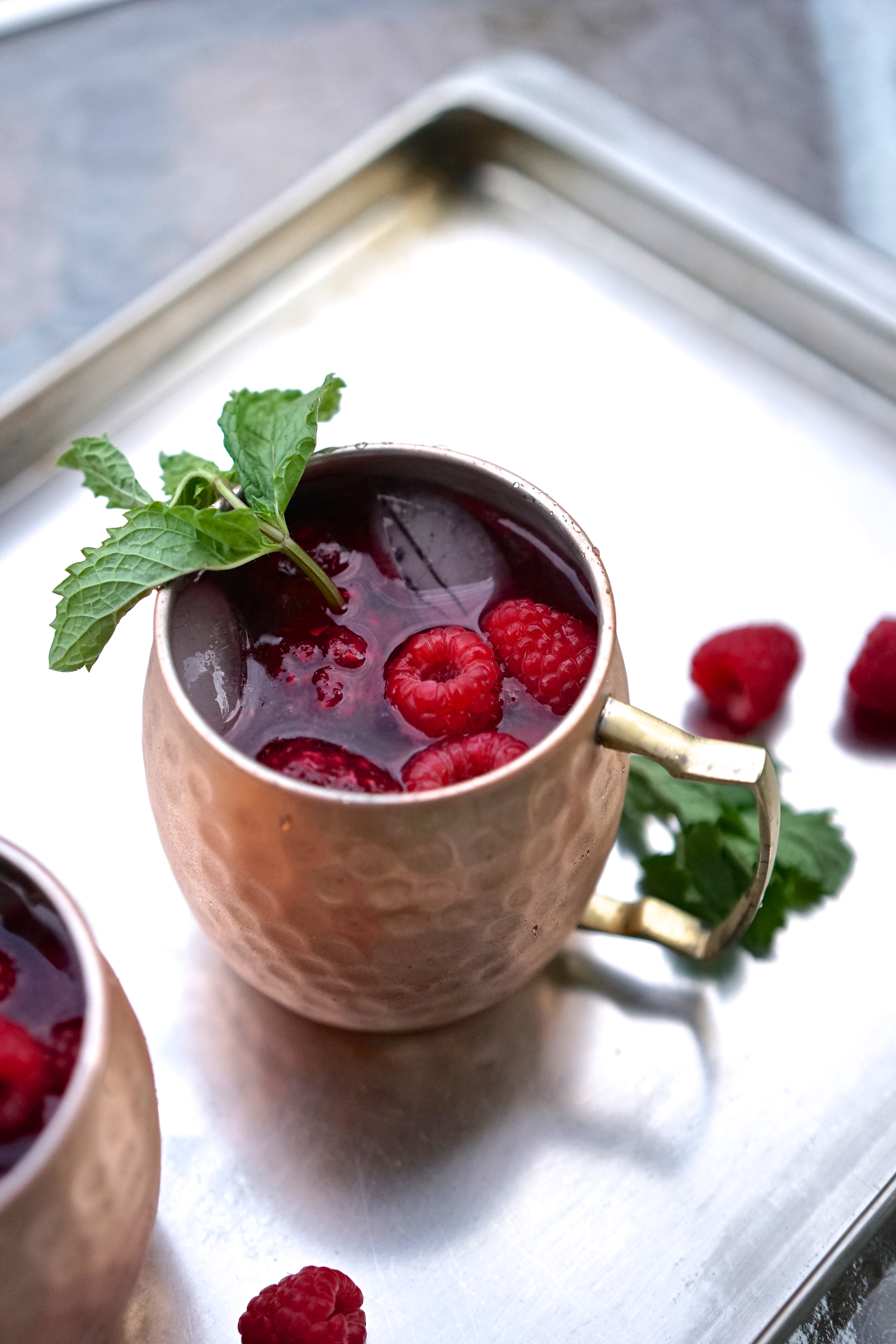 Moscow Mules with Raspberry Lime Zest Ice Cubes & Fresh Mint | Living Healthy in Seattle