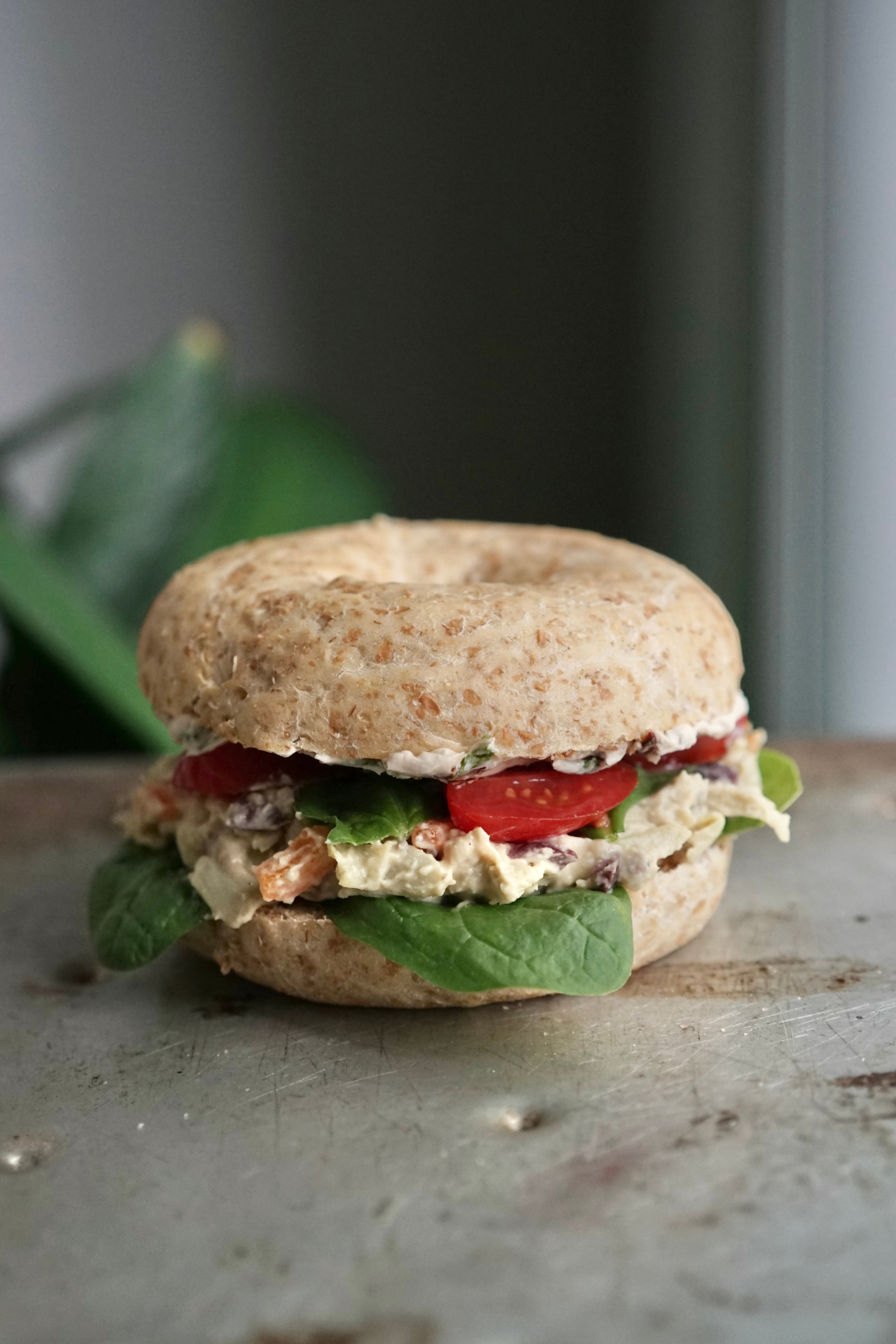 Vegan Mediterranean Bagel Sandwich with Sun-dried Tomato Cream Cheese & Artichoke Hummus | Living Healthy in Seattle